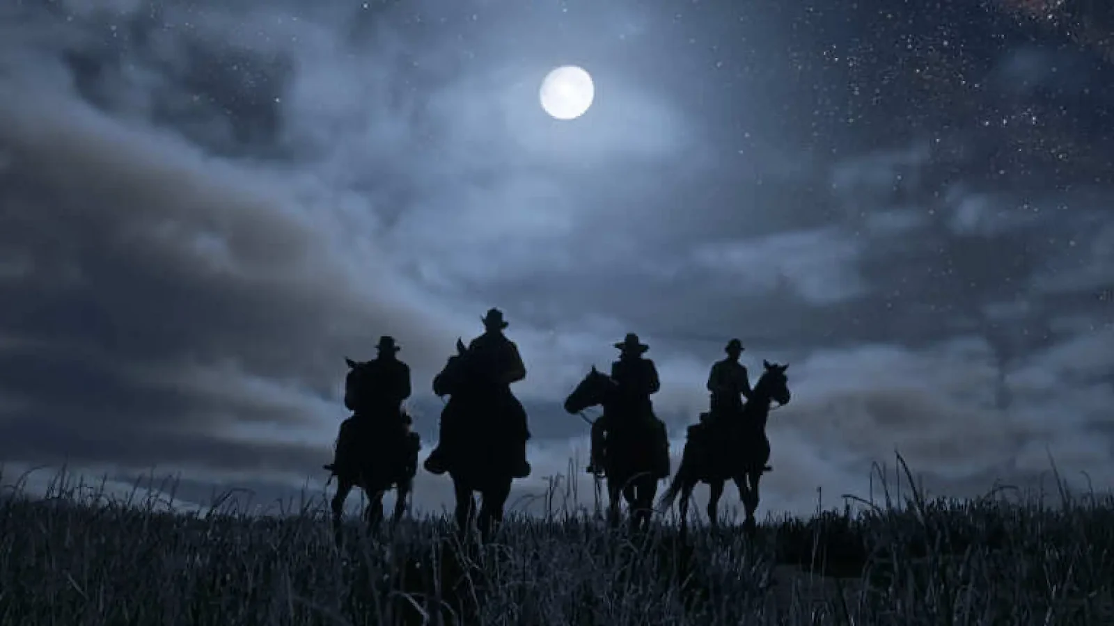 Jinetes cabalgando de noche en Red Dead Redemption 2, el juego base de Red Dead Online