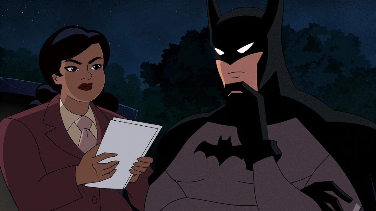 Renee Montoya junto a Batman en una escena nocturna de Batman Caped Crusader Chronicles