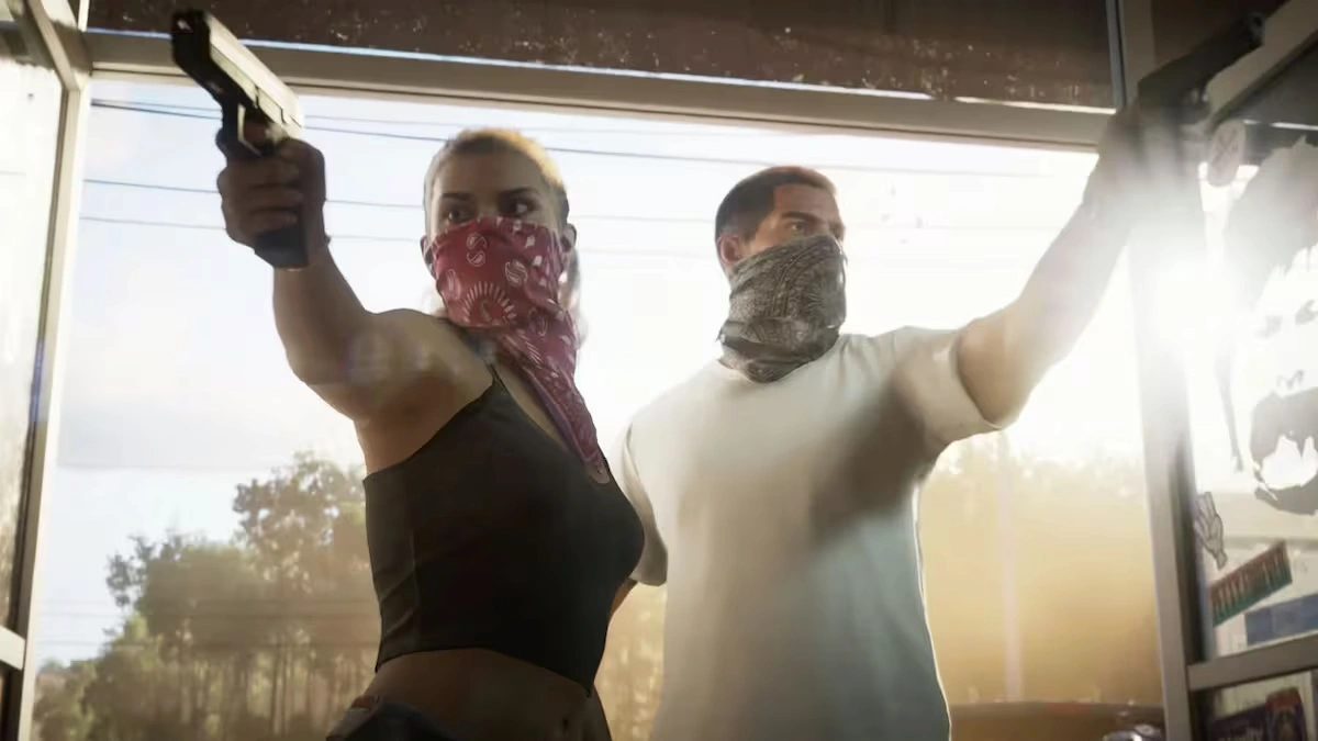 Jason y Lucia con el rostro cubierto y armas en la mano durante un robo en GTA 6