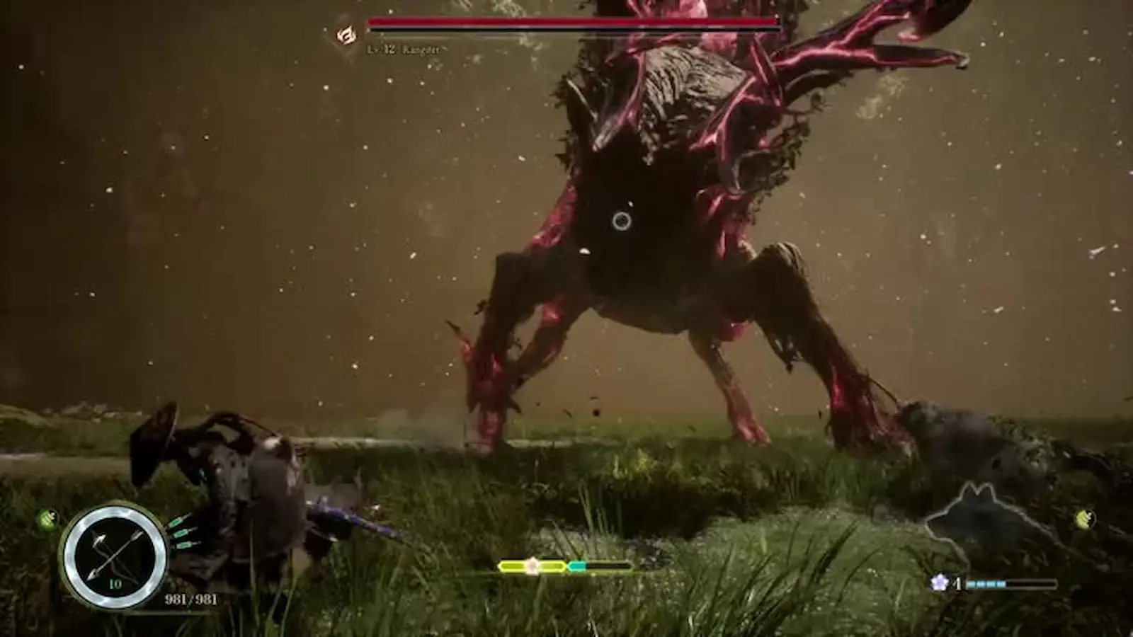 Combate contra una criatura gigante de zarcillos rojos en Beast of Reincarnation, con el medidor de Entrelazado en el HUD
