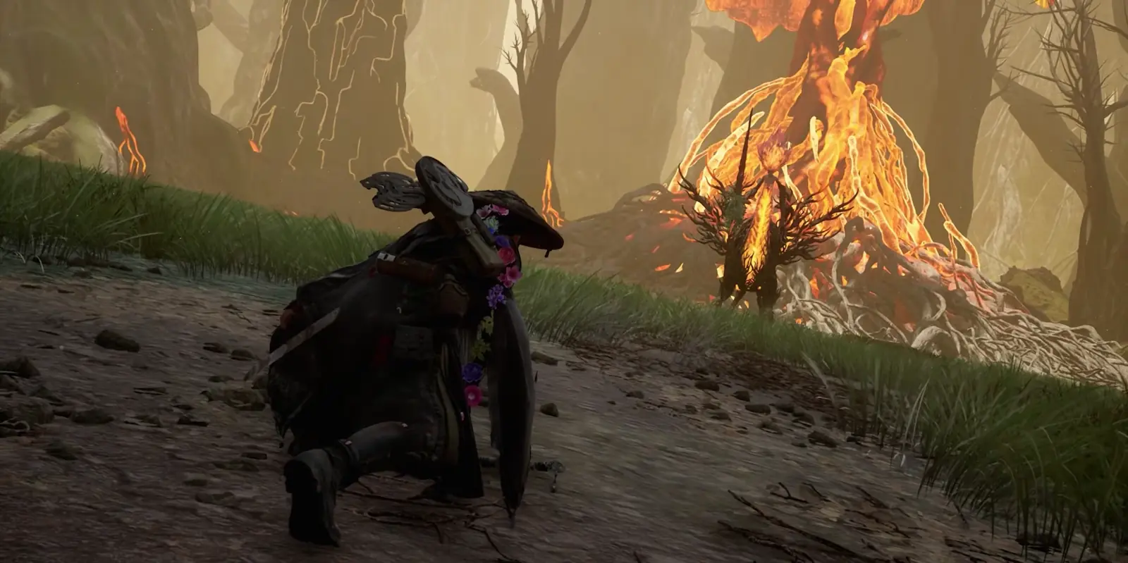Emma en el suelo frente al jefe final de Beast of Reincarnation
