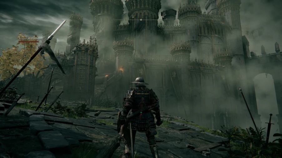 El Tiznado frente a un castillo en ruinas de las Tierras Intermedias en ELDEN RING Tarnished Edition