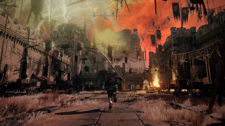 Ciudad en ruinas en llamas en ELDEN RING Tarnished Edition, con el personaje corriendo entre el fuego