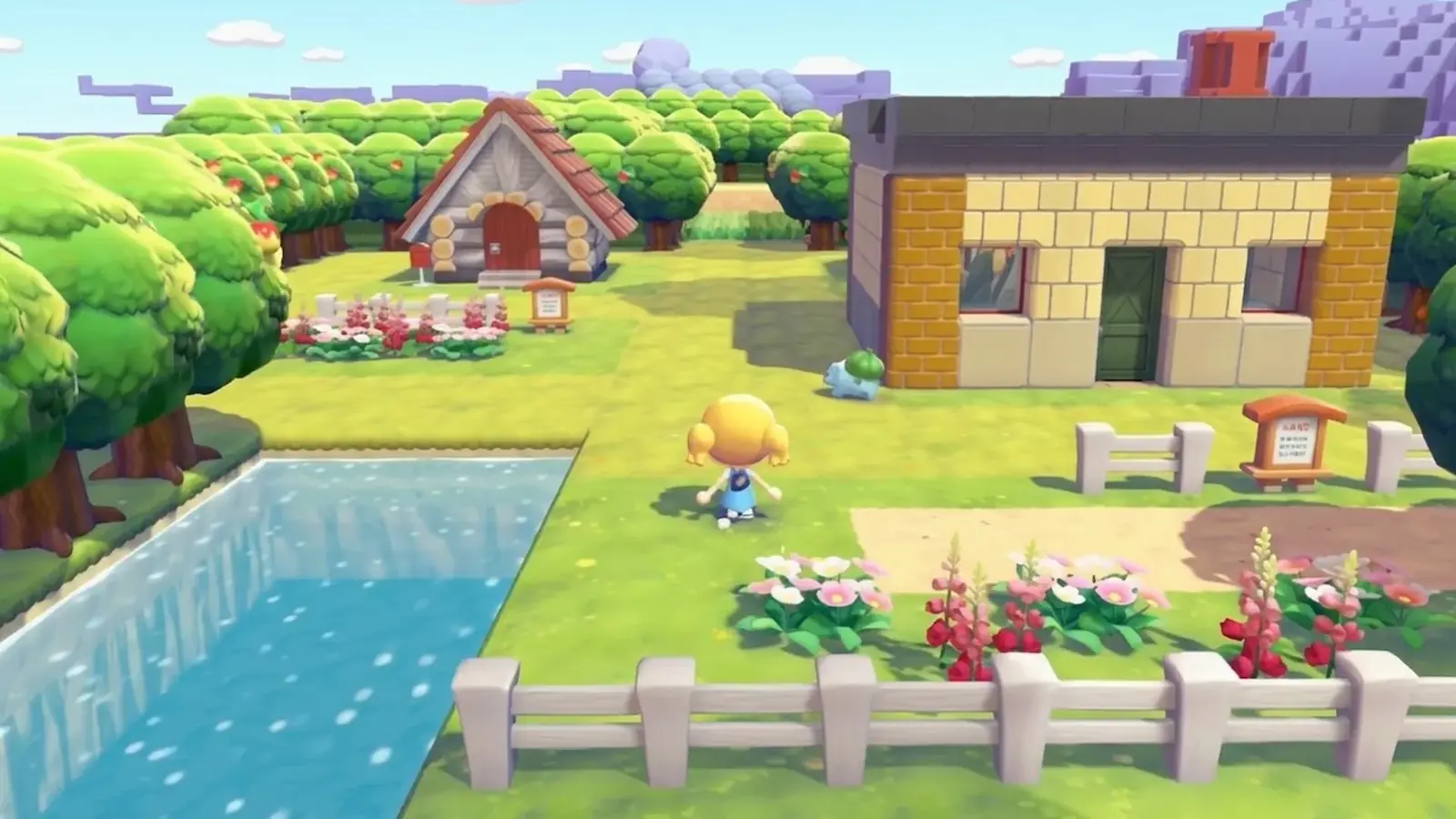 Zona construida de Pokémon Pokopia con casas, un canal de agua y un Bulbasaur junto a la entrada