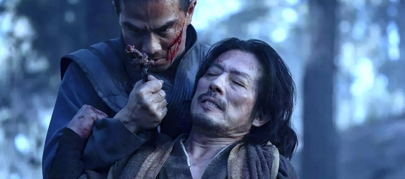 Hanzo Hasashi peleando en la escena inicial de Mortal Kombat, el ancestro de Cole Young
