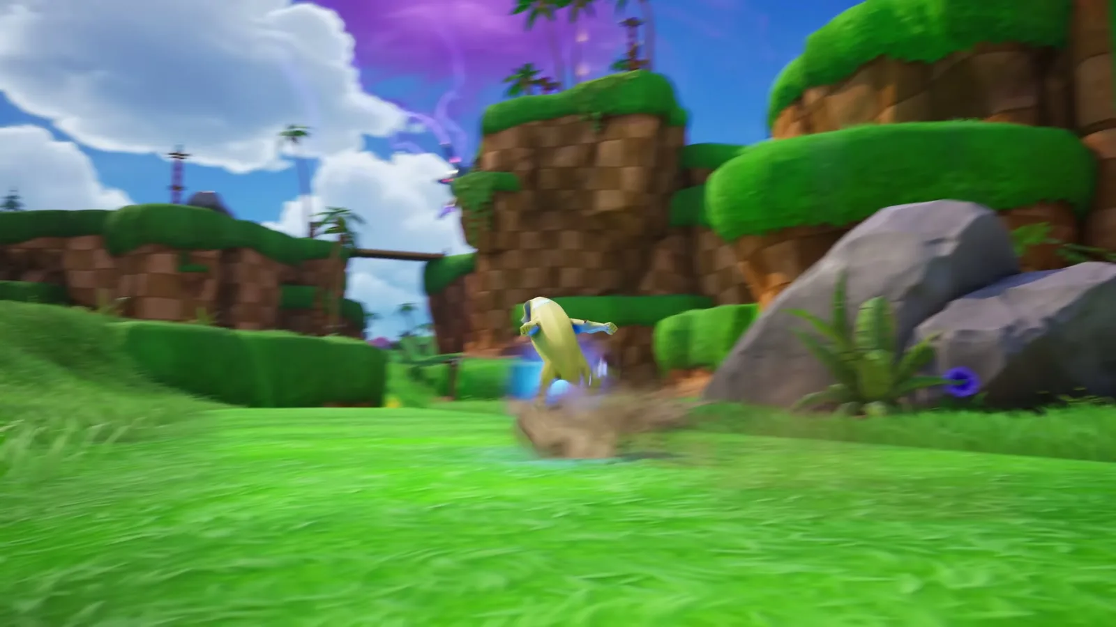 Plano abierto de la nueva zona de Sonic en Fortnite: colinas verdes, tierra a cuadros, palmeras y un cielo violeta con efecto glitch