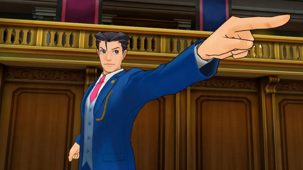 Phoenix Wright señalando con el dedo desde el banco de la defensa en una escena de Ace Attorney Dual Destinies VR