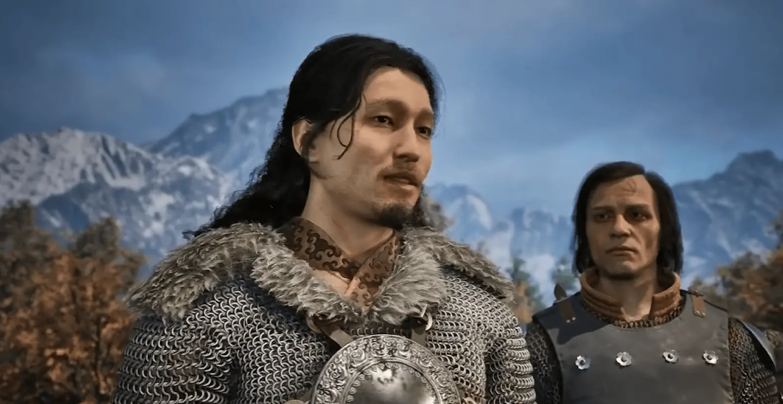 Dos personajes frente a las montañas del valle de Sangora en The Blood of Dawnwalker
