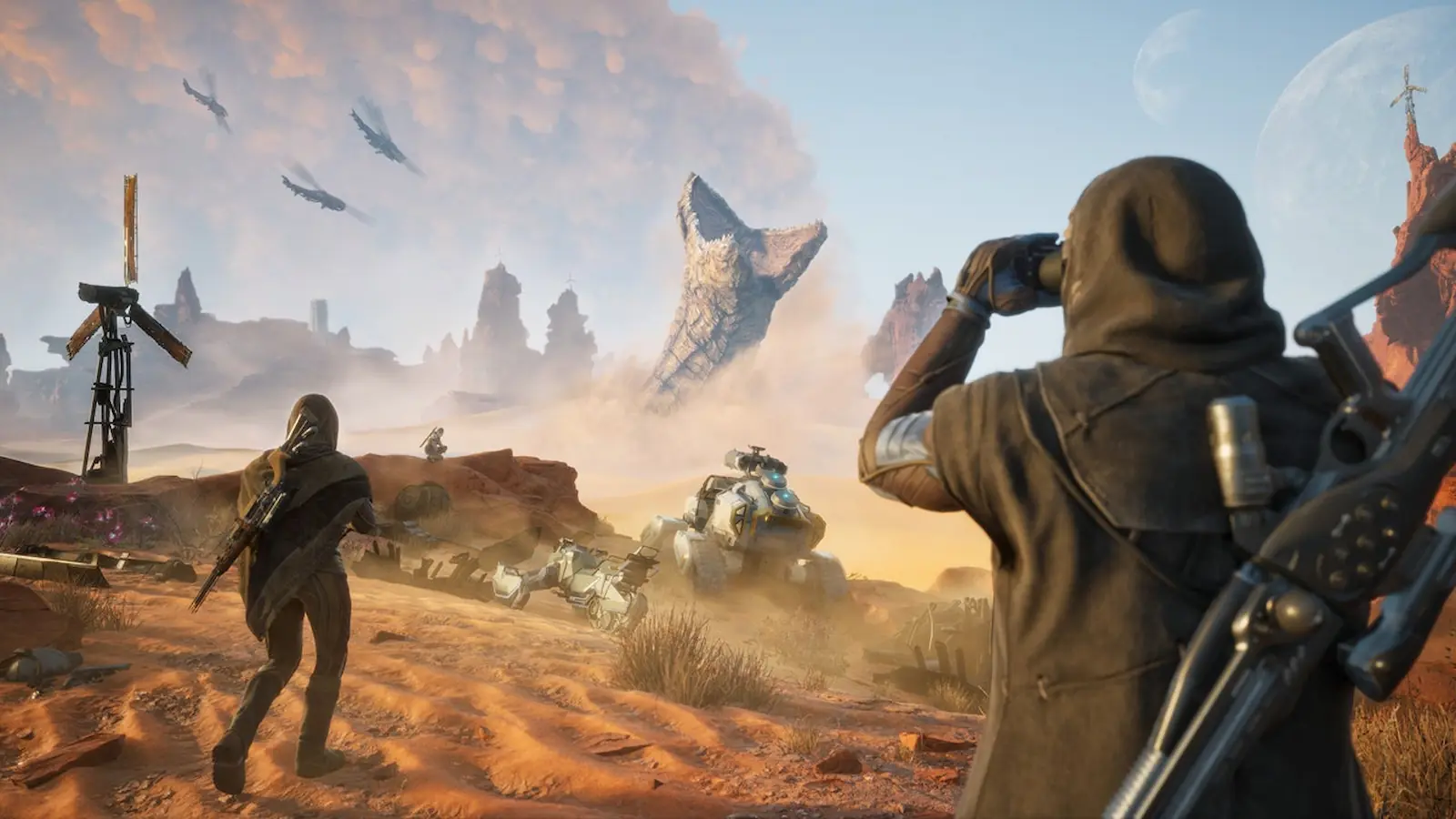 Dos personajes observan el desierto de Arrakis mientras los ornitópteros sobrevuelan la zona en Dune: Awakening
