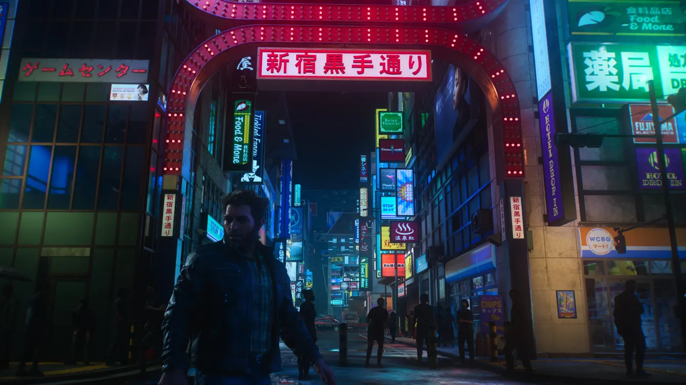 Logan camina por una calle nocturna con carteles de neón en japonés