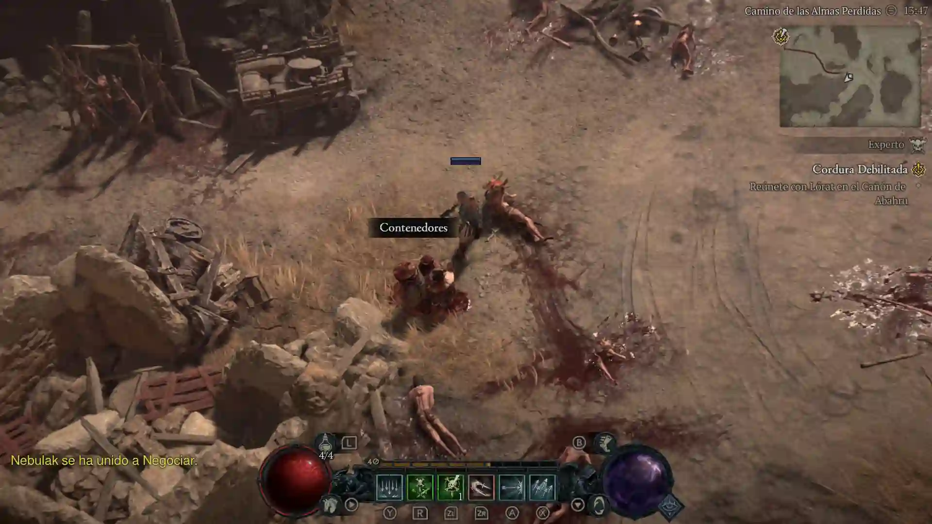 Diablo IV en Switch 2: pelea en un campamento arrasado, con la barra de habilidades en pantalla