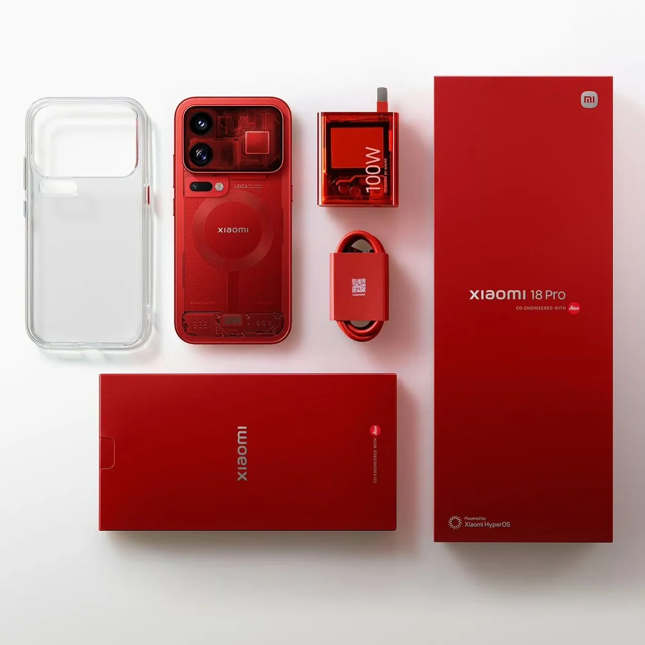 Contenido de la caja del Xiaomi 18 Pro rojo: teléfono, funda transparente, cargador de 100 W y cable