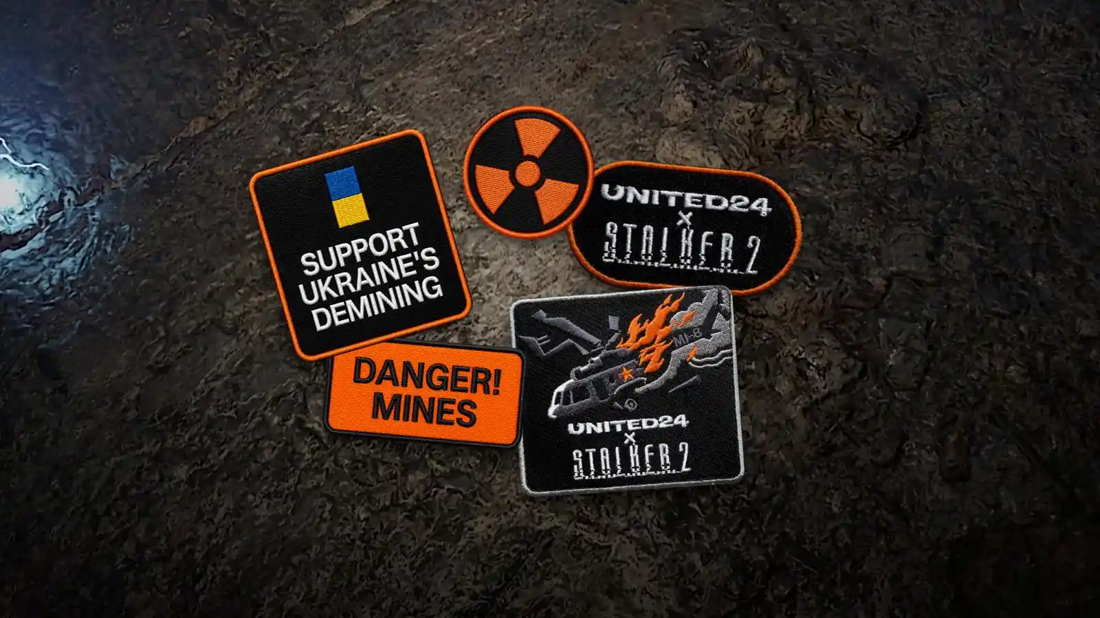 Parches de la campaña de S.T.A.L.K.E.R. 2 y UNITED24 con las leyendas Support Ukraine's Demining y Danger! Mines