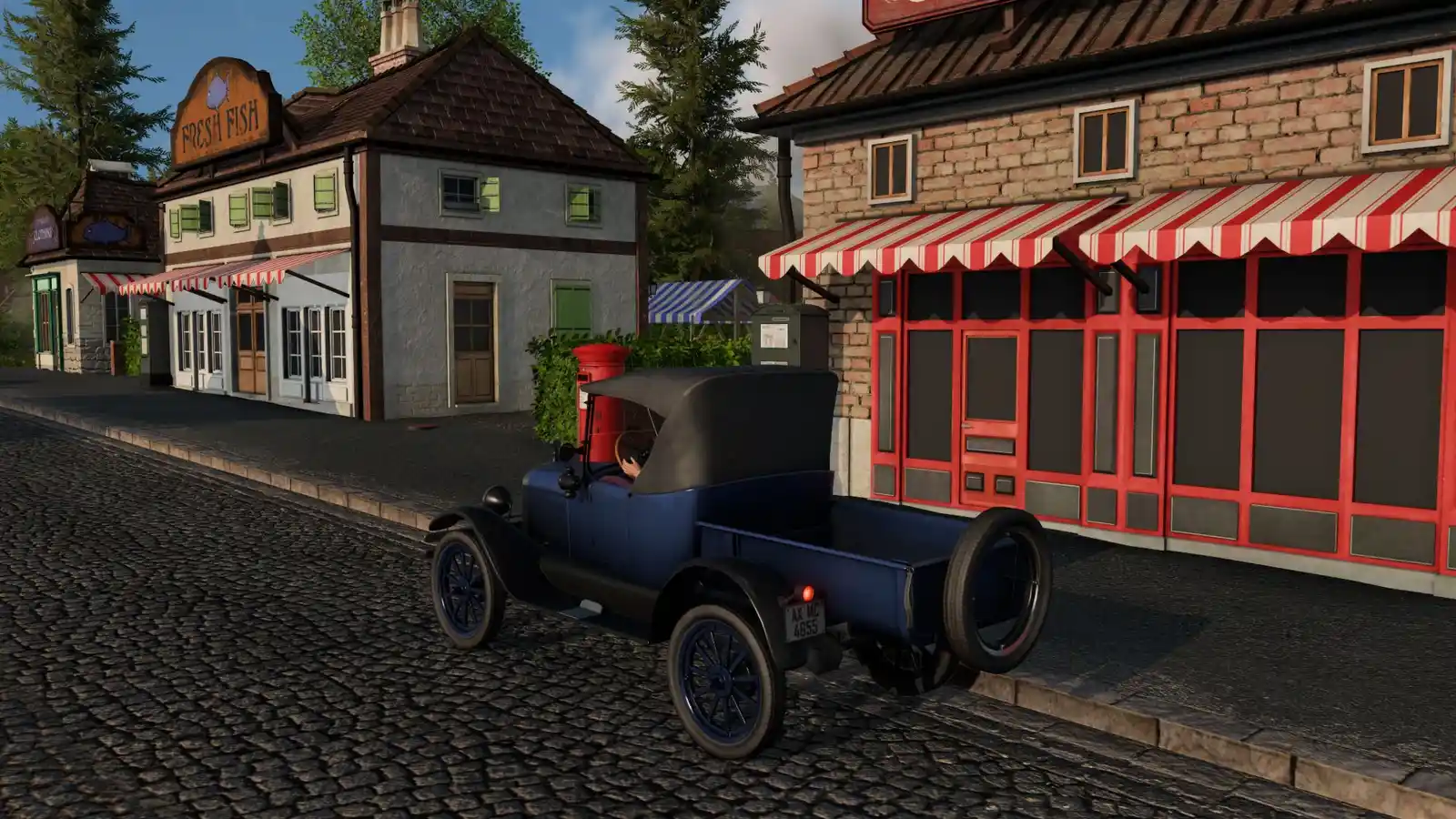Camioneta de época en una calle empedrada de Transport Fever 3, vista con la cámara al nivel del suelo