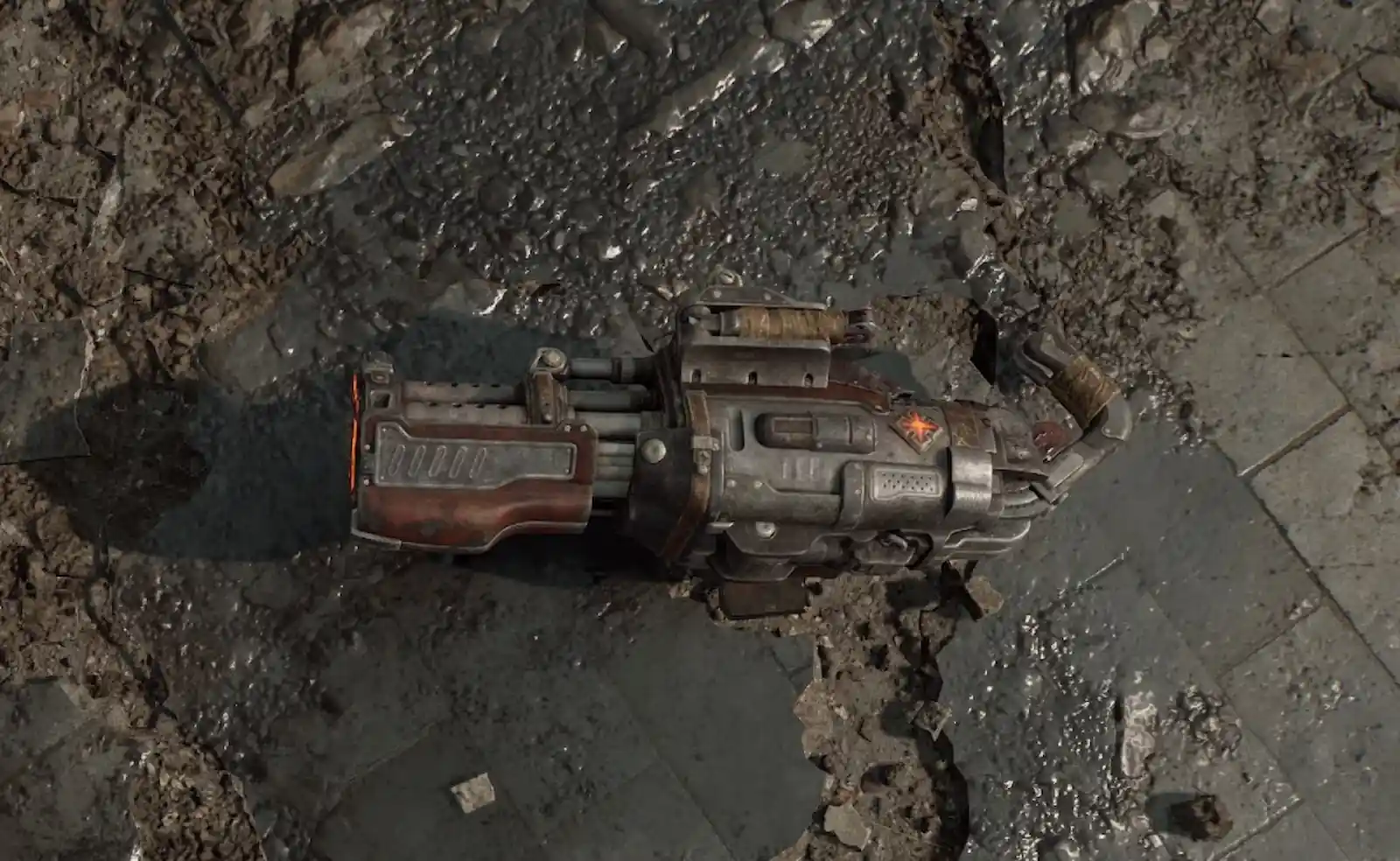 Un arma pesada tirada en el suelo de Kalona en Gears of War: E-Day