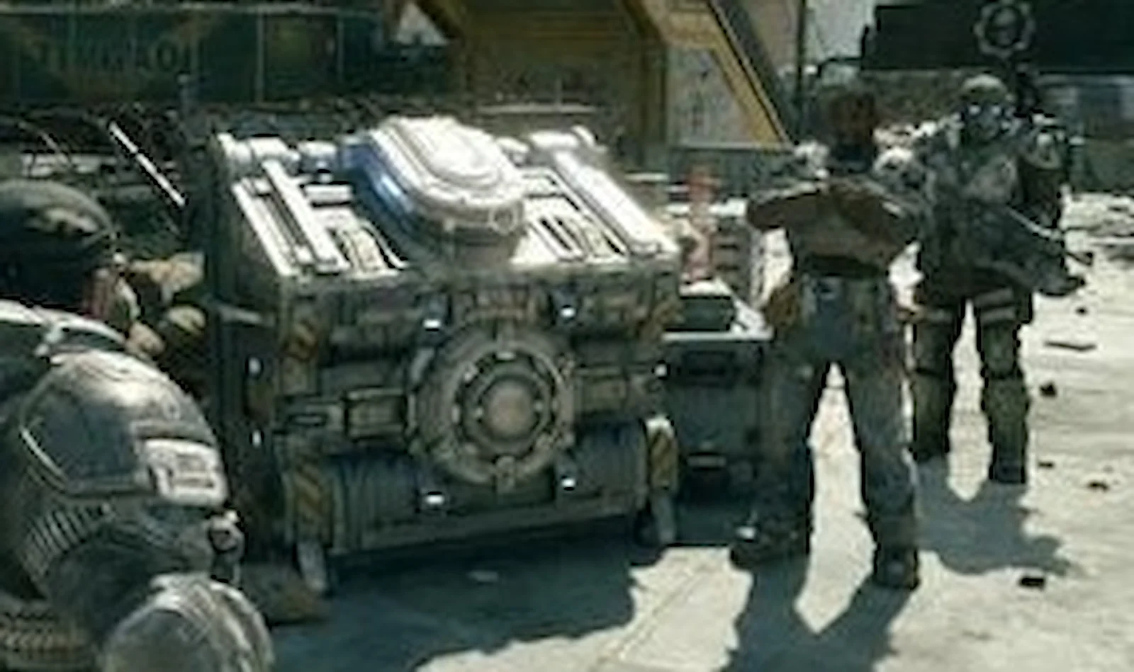 Soldados del COG junto a un depósito de suministros en Gears of War: E-Day