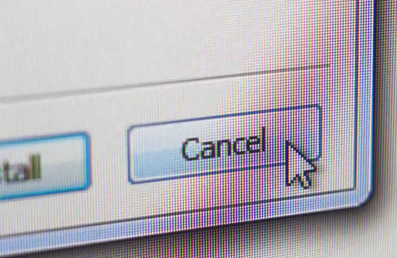 Cursor del mouse sobre el botón Cancel en una pantalla de computadora