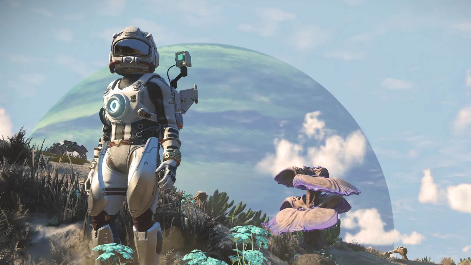 Un viajero con traje espacial frente a un planeta gigante en No Man's Sky, en la versión para iPhone y iPad